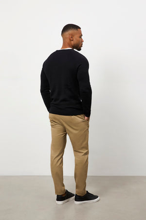 Pure Cotton Knitted V-Neck Sweater in Black - TAILORED ATHLETE - USA
