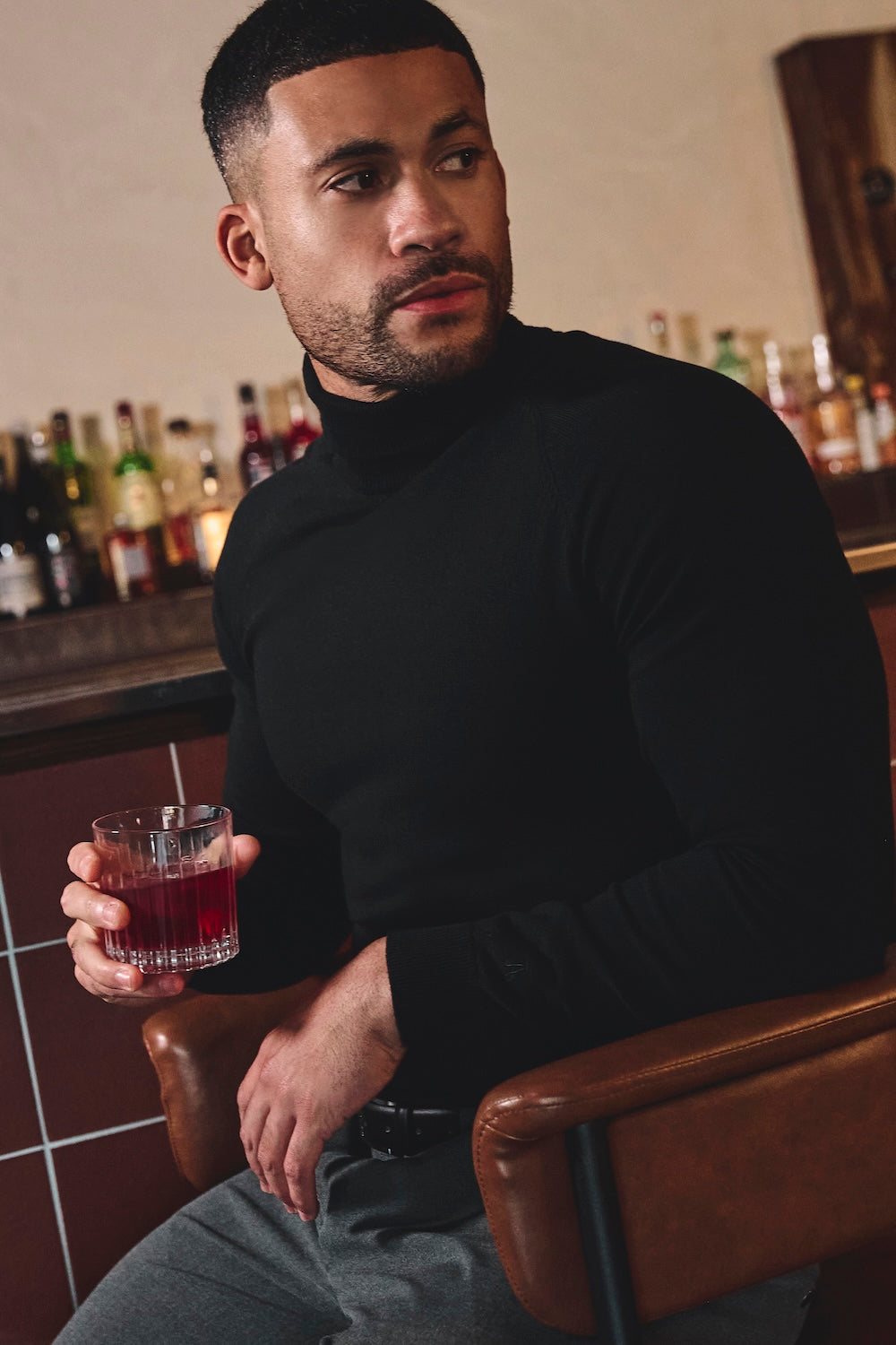 Cotton Blend Roll Neck Sweater in Black - TAILORED ATHLETE - USA