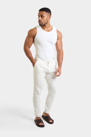 Linen Blend Cropped Pleated Pants in Chalk - TAILORED ATHLETE - USA