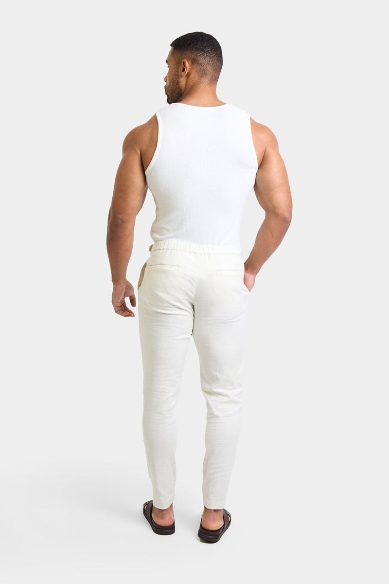 Linen Blend Cropped Pleated Pants in Chalk - TAILORED ATHLETE - USA