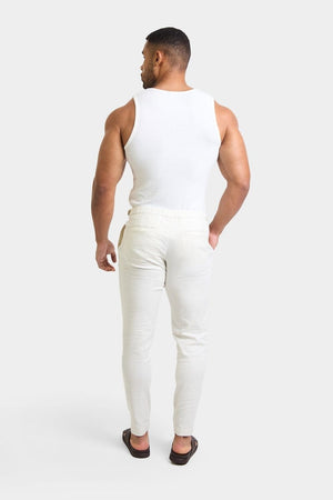 Linen Blend Cropped Pleated Pants in Chalk - TAILORED ATHLETE - USA