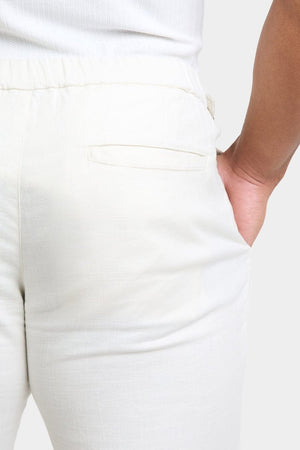 Linen Blend Cropped Pleated Pants in Chalk - TAILORED ATHLETE - USA